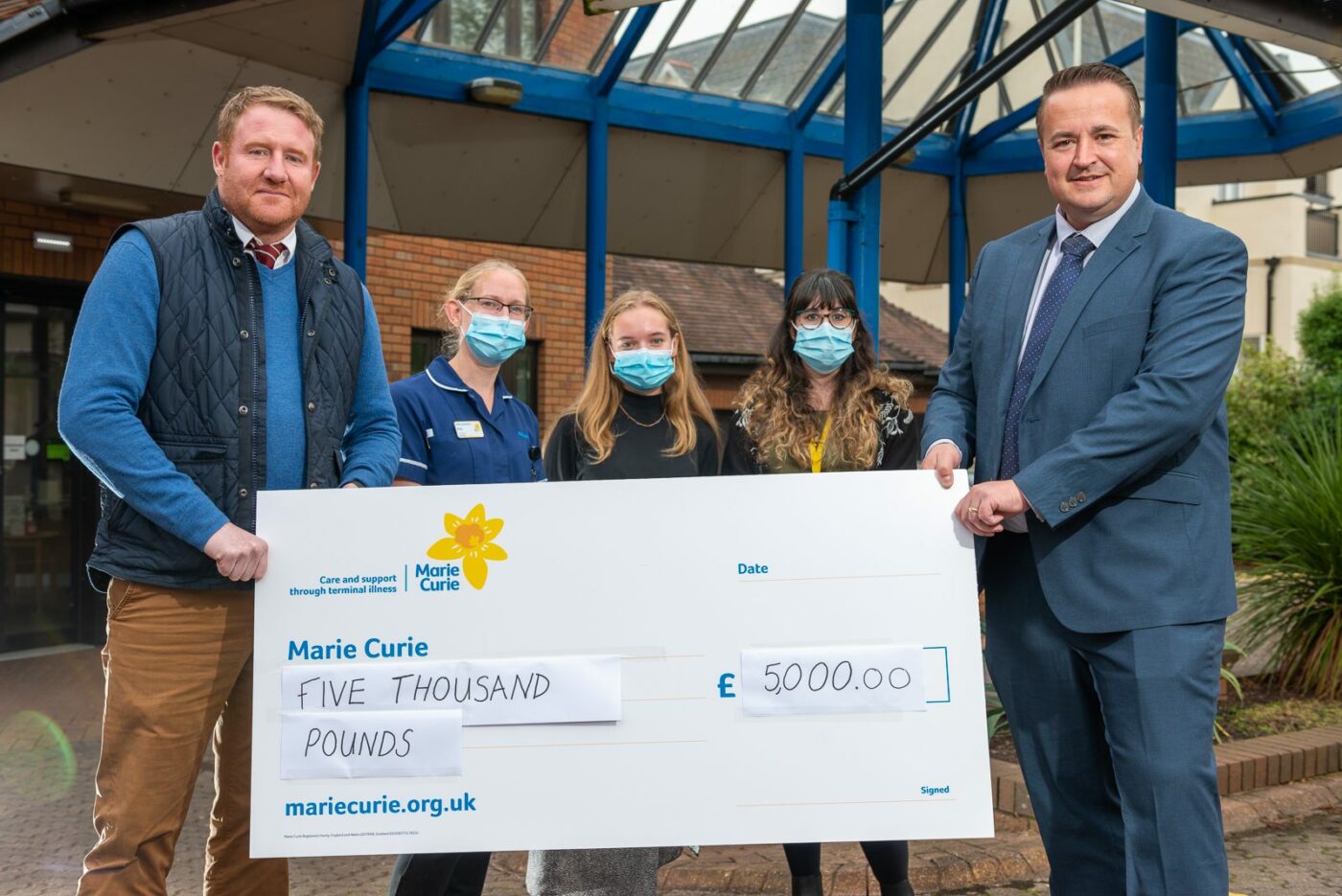 blue self storage donation to Marie Curie